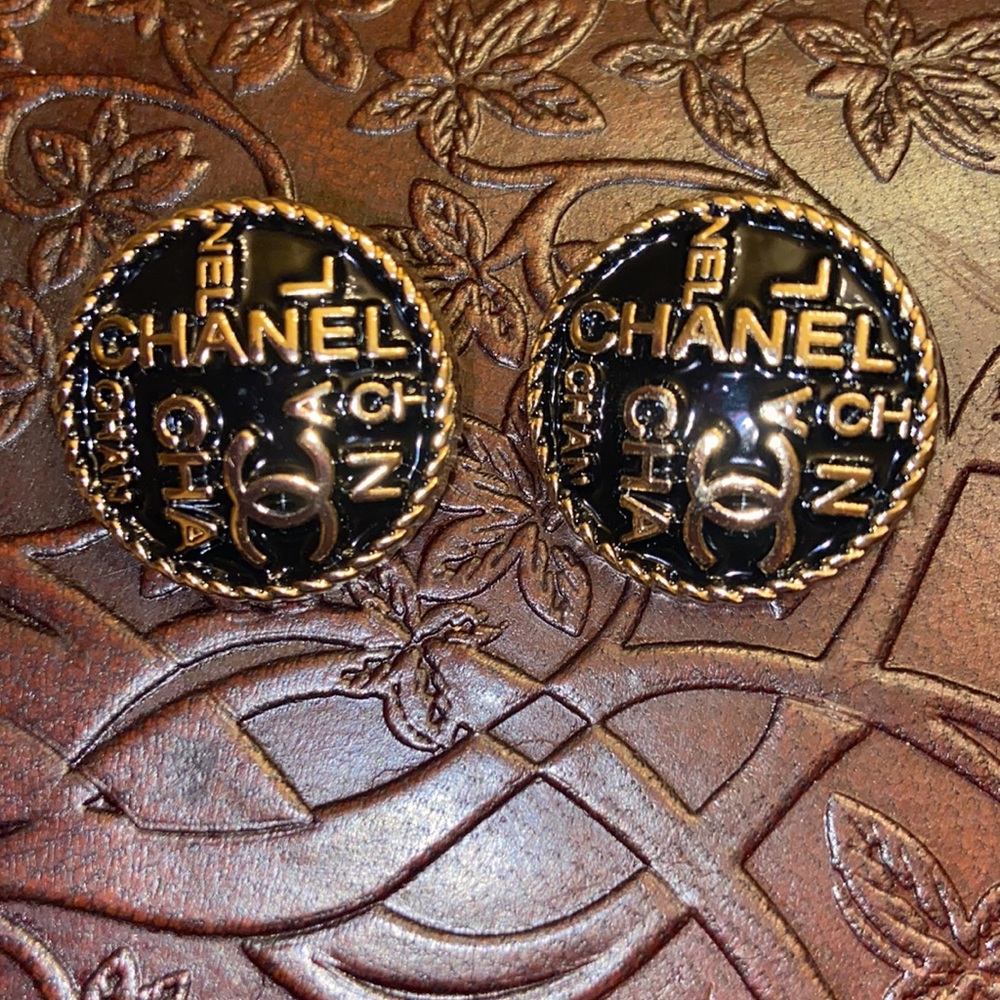 Black and Silver Chanel button set of 2 no gold
Left